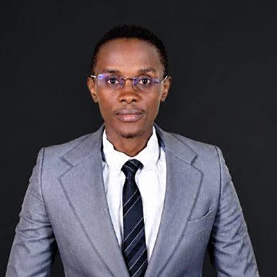 Dr. Kaweesa Joseph, Executive Director