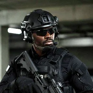 Protection officer in heavy operator gear