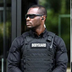 Protection officer in standard tactical uniform