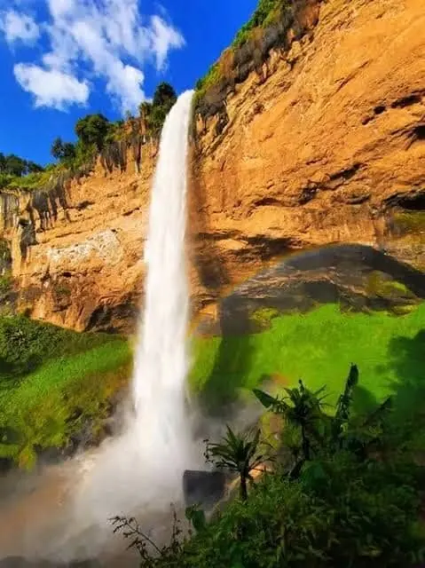 Side view of Sipi Falls cascading in Eastern Uganda's highlands
